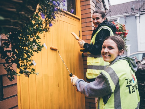 Tai Tarian staff working on a community project