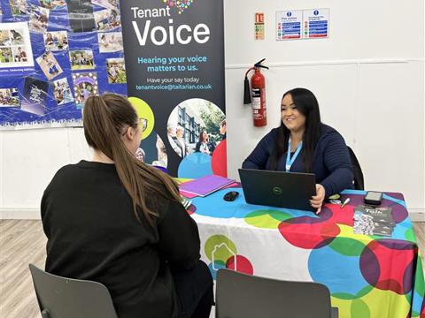 Our tenant engagement officer talking to a tenant